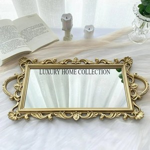 Bandeja de espejo de vidrio de metal decorativa inspirada en el diseñador con una silueta elegante y detalles atemporales para el estilo moderno del hogar - Product Image 1