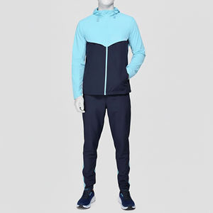 Ensemble de survêtement léger bicolore bleu clair et bleu marine pour homme avec veste à capuche zippée et pantalon de jogging assorti à rayures latérales - Product Image 2