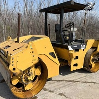 Compacteur vibrant à double tambour d'occasion CAT CB564D pour projets de construction routière en asphalte à vendre