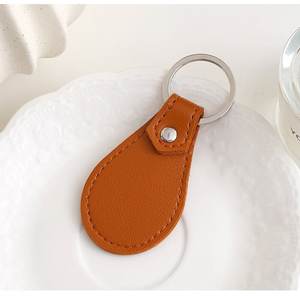 حامل مفاتيح جلدي بيضاوي الشكل مخصص لعام 2025، سلسلة مفاتيح جلدية بيضاوية - Product Image 6