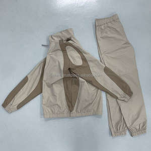 ชุดวอร์มกันลมแบบยูนิเซ็กซ์ แห้งเร็ว มีฮู้ด เหมาะสำหรับวิ่ง ออกกำลังกายกลางแจ้ง ตะเข็บตัดกัน แต่งขอบยางยืด เรียบง่าย ผลิตจากไนลอน 100% - Product Image 1