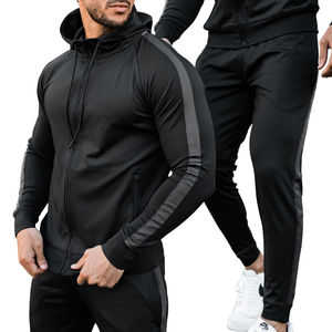 OEM al por mayor de algodón Unisex Color sólido liso chándal conjunto Jogging Sudadera con capucha hombres chándal al por mayor Jogging Wear cordón - Product Image 1