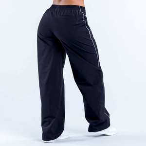 Pantalons de survêtement larges pour femmes avec logo personnalisé 2025, bordures contrastées, nylon tissé léger, séchage rapide, pantalons de sport d'entraînement - Product Image 4