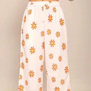 Pantaloni rilassati con stampa floreale bianco e arancione con 2 tasche e pantaloni con cintura completamente elastica per le donne che lavorano pantaloni eleganti a vita alta