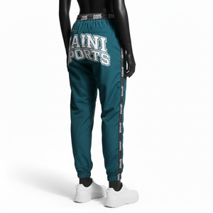 Pantalon coupe-vent pour femme, tissu en nylon tissé de qualité supérieure, couleur sarcelle, design de panneau latéral, logo jacquard personnalisé, pantalon coupe-vent - Product Image 5