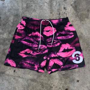 Pantalones cortos de malla personalizados de doble capa de sublimación de poliéster de baloncesto para hombre de alta calidad - Product Image 3