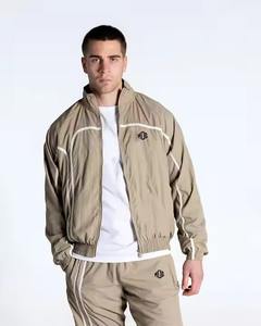 Chándal de nailon con logotipo personalizado de alta calidad, conjunto cortavientos de entrenamiento informal, conjunto de 2 piezas con capucha y cremallera, conjunto de chándal Unisex - Product Image 2