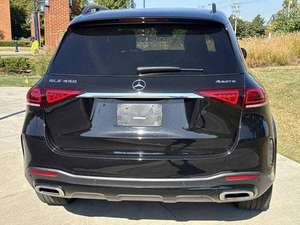 SUV USADO DE ULTRA LUJO 2024 C-200 299HP 4.0L TRANSMISIÓN AUTOMÁTICA DE 9 VELOCIDADES NEUMÁTICOS R18 IZQUIERDO INTERIOR DE TELA COLOR ELÉCTRICO OSCURO COPILOT 7 PLAZAS - Product Image 3