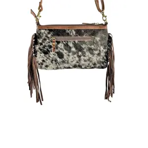 Exclusive Brown & White Leather Crossbody Bag with hair on cowhide and brown suede fringe Top Indian Manufacturer & Supplier