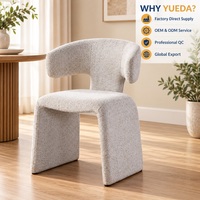 Chaise de salle à manger moderne en lin blanc avec dossier incurvé et assise rembourrée pour salle à manger