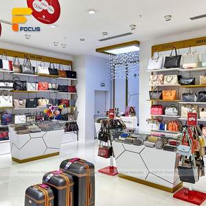 Accesorios de tienda de equipaje y bolsos personalizados Estantes de exhibición de bolsas de viaje modernos Estantes de maletas al por menor - Product Image 4