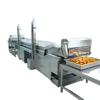 Machine à frire entièrement automatique pour nuggets de poulet et galettes de viande avec fonction de filtration d'huile pour usine de transformation de produits carnés