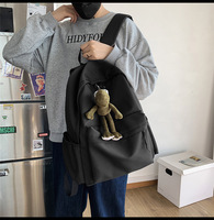 Sac à dos noir grande capacité avec pendentif mignon monstre marron, en polyester, fermeture éclair, durable, décontracté, pour voyage, école, unisexe