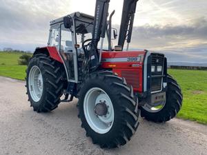 Massey Ferguson 399 con cargador autonivelante Quick 660 en venta - Product Image 5