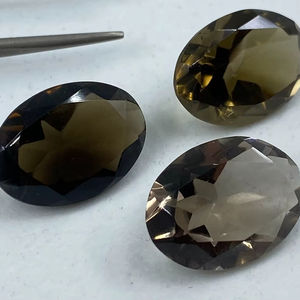 พลอยควอตซ์สโมคกี้ทรงรีเจียระไนหลากหลายขนาดตั้งแต่ 6x4 มม. ถึง 25x18 มม. สำหรับทำเครื่องประดับ - Product Image 1