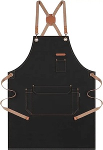 Delantales de salón de peluquería negros unisex estilo sin mangas con bolsillos de cuero para peluquerías hechos en Pakistán - Product Image 2