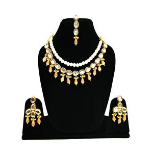 Ensemble de collier Kundan plaqué or 18 carats pour femme, en acier inoxydable et cuivre plaqué or 24 carats, orné de pierres de zircon, pour mariage - Product Image 1