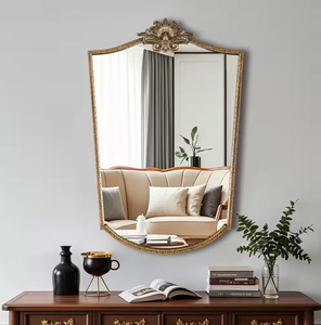 Large <b>mirror</b> with an intricate filigree circle frame, a modern and decorative statement piece, available at wholesale price. - Product Image 6