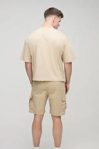 กางเกงขาสั้นผู้ชาย ผ้าฝ้าย 100% ไม่ถักทอ น้ำหนักปานกลาง แห้งเร็ว ทรงทันสมัย ใส่สบายในฤดูร้อน ระบายอากาศได้ดี เหมาะสำหรับออกกำลังกายและกิจกรรมกลางแจ้ง - Product Image 3