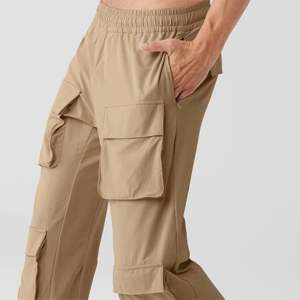 Pantalon tactique Ripstop pour l'extérieur et l'utilisation d'un matériau à séchage rapide avec poches cargo disponible en camouflage et couleur unie - Product Image 3
