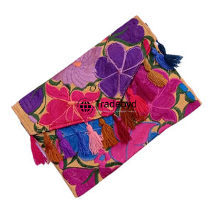 Pochette brodée ethnique avec patchwork vibrant pour sac à main femme et fête par Tradebyd - Product Image 1