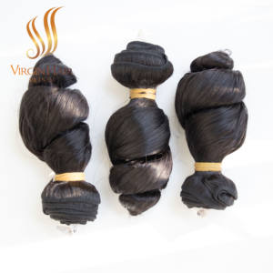 ผมต่อ Remy เกรด 10A คุณภาพสูงจากเวียดนามและกัมพูชา แบบลอนคลาย สีผมธรรมชาติ ผลิตด้วยเครื่องจักร แบบ Double Weft - Product Image 2