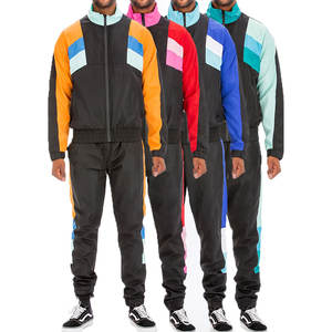 Ensemble de survêtement coupe-vent élégant pour hommes et femmes, vêtements de sport confortables et coupe-vent, prix direct d'usine, fabrication OEM personnalisée - Product Image 3