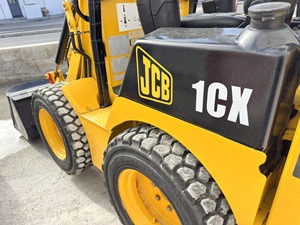 Mini Retroexcavadora Compacta 4x4 JCB 1CX |   Retroexcavadora compacta JCB 1CX con ruedas, accionada por diésel, para construcción - Product Image 6