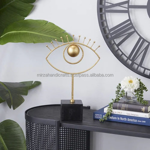 Escultura de ojo de ver de Metal dorado decorativo, diseño único terminado en oro metálico brillante para decoración del hogar - Product Image 2
