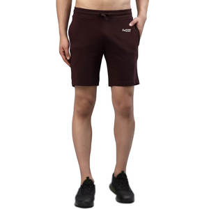 กางเกงขาสั้นออกกำลังกายสำหรับผู้ชายน้ำหนักเบายืดได้สีพื้นและโลโก้ที่ปรับแต่งได้ - Product Image 1