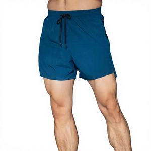 Pantalones cortos sueltos informales al por mayor para hombre, pantalones cortos de poliéster personalizados de malla de secado rápido para hombre, pantalones cortos de baloncesto - Product Image 1