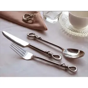 Ensemble de couverts en acier portable au design élégant noué, parfait pour les cadeaux de mariage et de Noël, articles vendus au prix de gros - Product Image 1