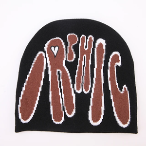 Vente en gros d'usine Bonnet d'hiver en jacquard de luxe Bonnet en tricot acrylique crâne avec logo personnalisé Style doux et luxueux pour le voyage - Product Image 4