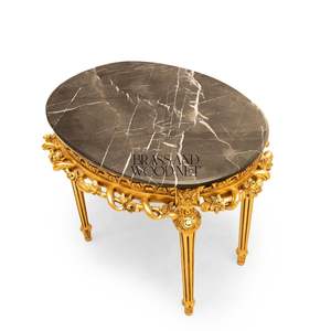 โต๊ะข้างทรงกลมหรูหราสไตล์ราชวงศ์ พร้อมท็อปหินอ่อนสีดำพรีเมียม และโครงไม้แกะสลักลายทองคำประณีต ตกแต่งสไตล์พระราชวัง - Product Image 5