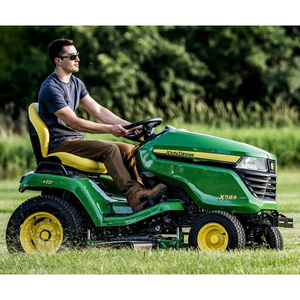 Tractor de jardín multifunción con accesorios intercambiables para el cuidado del césped y la preparación del suelo - Product Image 3