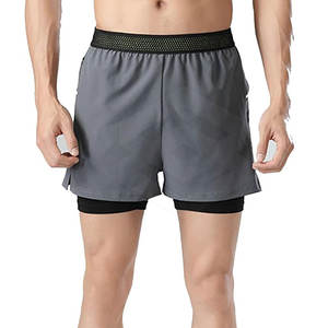 Pantalones cortos deportivos de doble capa OEM para hombre, nuevo diseño, estilo callejero, patrón sólido, poliéster, hechos al mejor precio - Product Image 1