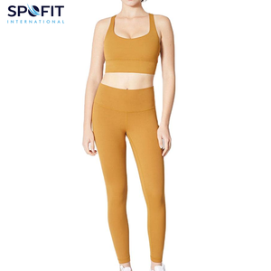 Conjunto Deportivo de Yoga para Mujer 2026, Colores Sólidos Populares, 2 Piezas, Cintura Elástica y Logotipo Frontal, Leggings y Sujetador de Secado Rápido - Product Image 1