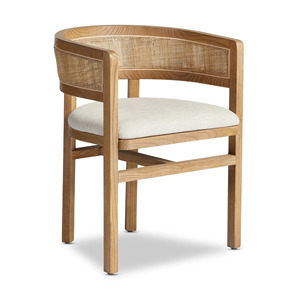 Esta es la silla de comedor Four Hands Cordoba, que tiene una estructura de madera de teca maciza en un color natural con un respaldo tejido de ratán. - Product Image 1