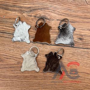 Nouveau design de porte-clés en cuir de vachette porte-clés en cuir de fourrure véritable porte-clés élégants porte-clés en cuir véritable de luxe de forme unique - Product Image 1