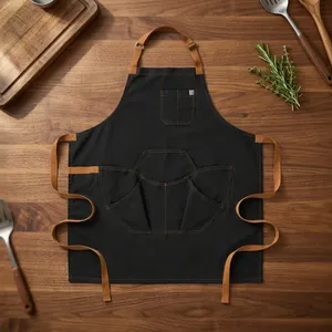 Delantal Clásico Negro Resistente y Reutilizable con Múltiples Bolsillos para Cocina y Uso Diario, Material de Lona, Estilo Tejido - Product Image 1