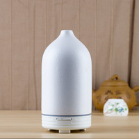 Diffuseur d'arômes avec diffuseur d'huile aromatique électrique en céramique Humidificateur d'air de table de chevet pour hôtel et usage domestique
