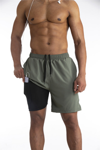 Venta al por mayor de pantalones cortos deportivos para hombres pantalones cortos de gimnasio para hombres ligeros 2 en 1 pantalones cortos de pista - Product Image 2