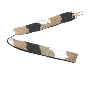 Correas de guitarra con cuentas de semillas hechas a mano, Color negro, blanco y dorado con diseño de monedero de estrella, accesorio de moda bordado a mano - Product Image 1
