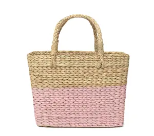 High quality best selling model eco-friendly water hyacinth woven pinky shopping bag with handle for beach holiday shopping