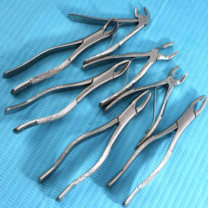 JUEGO DE 7 FÓRCEPS DE EXTRACCIÓN DENTAL DE ACERO INOXIDABLE ALEMÁN A + CALIDAD Farhan Products & Co - Product Image 1