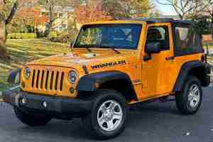 2024 Sport 4x4 Volante a la Izquierda Asientos de Cuero Sin Reserva 1 Propietario Transmisión Manual de 6 Velocidades Acabado Transparente Mayormente sin Modificaciones - Product Image 4