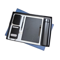 Ensemble cadeau d'affaires promotionnel personnalisé de qualité supérieure 5-en-1 : bouteille isotherme, carnet, stylo roller noir, porte-cartes, porte-clés