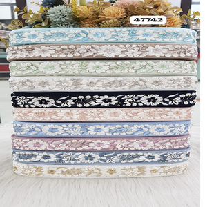 Fleur sur mesure conçue avec des lacets brodés séquentiels de 1 pouce de largeur pour les robes et à des fins de revente. - Product Image 1