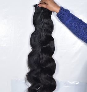 Venta al por mayor de extensiones de cabello ondulado natural vietnamita negro de las mujeres de materia prima de doble trama de la máquina de cutícula alineada paquete indio - Product Image 5