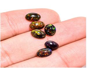 โอปอลเอธิโอเปียสีดําธรรมชาติพลอยวงรีเรียบ Cabochon หลวมในราคาโรงงานขายส่งจากซัพพลายเออร์ผู้ผลิตสีดํา st - Product Image 5